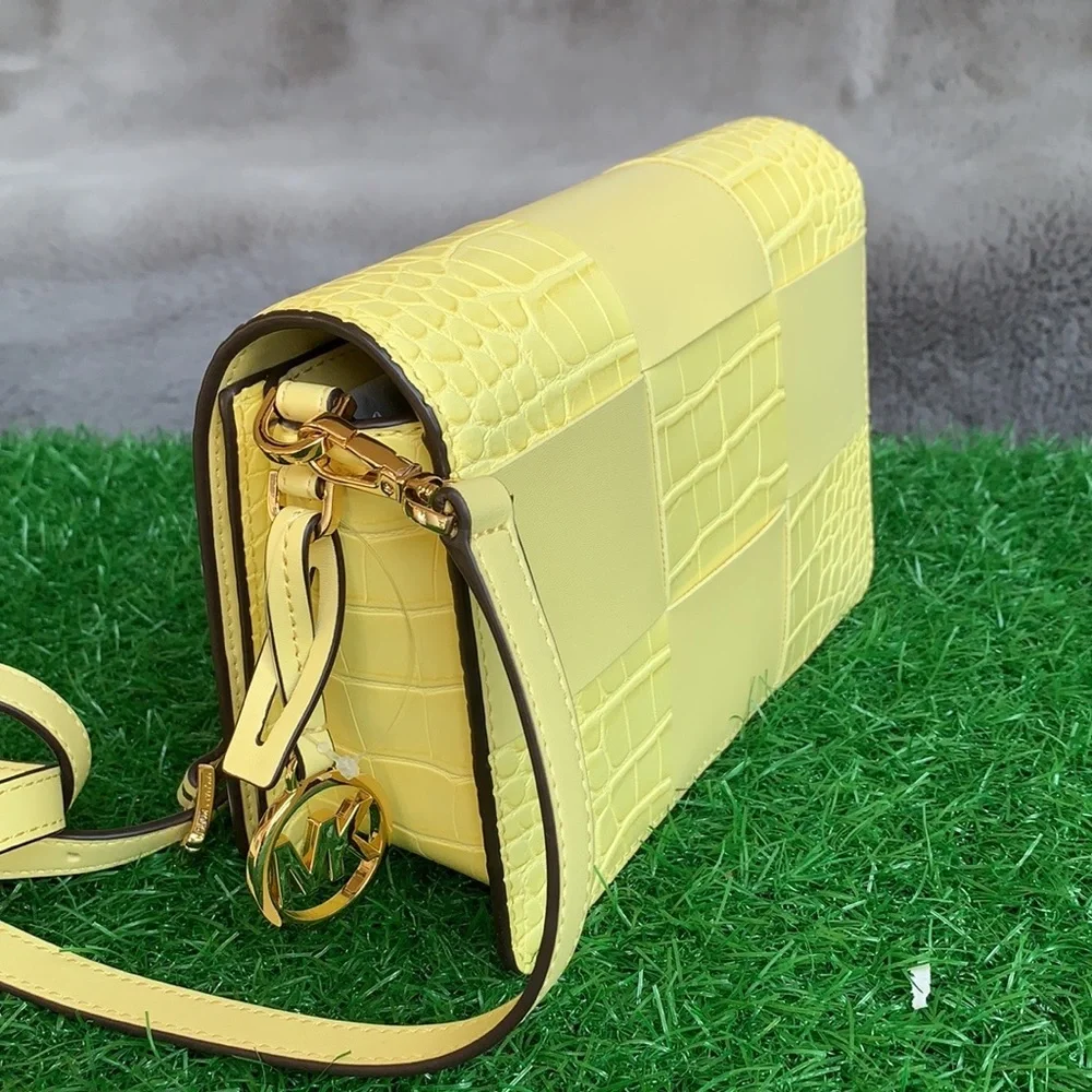 Michael Kors Mercer Sm clutch XBODY Buttercup